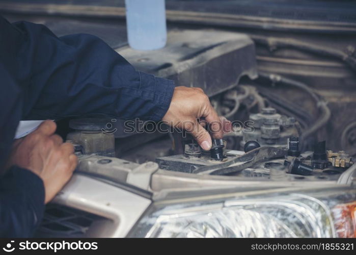 Mechanic car service auto garage in automotive mobile center. Technician workshop repair engine motor vehicles service mechanical engineering business. Automobile mechanic hands car repairs technic