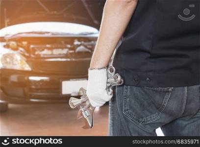 Mechanic man repairing car