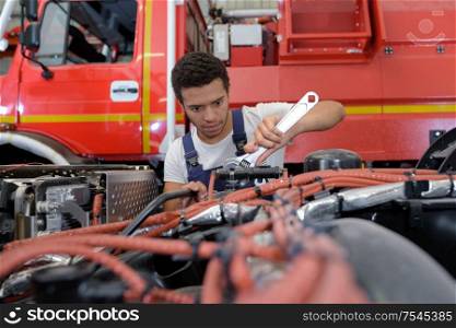 mechanic man working with a wrench