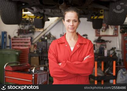 Mechanic standing in garage