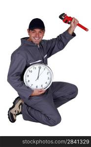 Mechanic with a clock showing noon