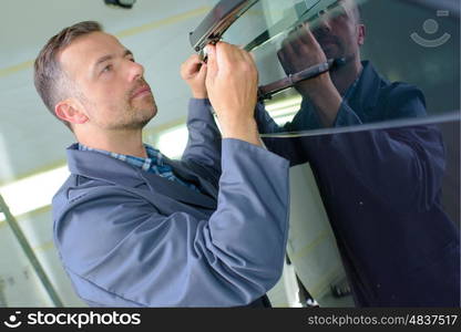 Mechanic worling on panel