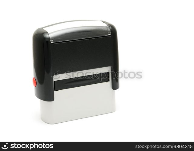 Mechanical office rubber stamp on a white background.