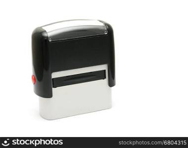 Mechanical office rubber stamp on a white background.