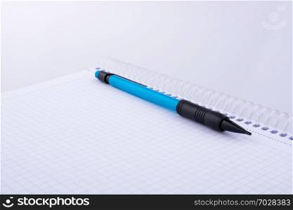 mechanical pencil of various color on white background