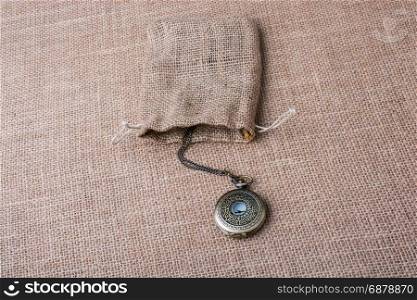 Mechanical pocket watch on a sack