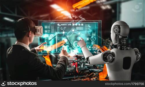 Mechanized industry robot and human worker working together in future factory . Concept of artificial intelligence for industrial revolution and automation manufacturing process .. Mechanized industry robot and human worker working together in future factory