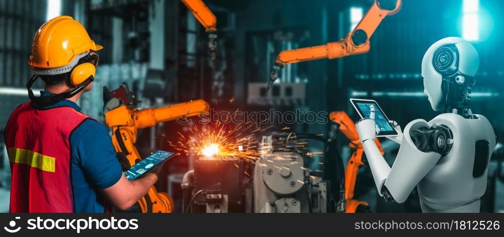 Mechanized industry robot and human worker working together in future factory . Concept of artificial intelligence for industrial revolution and automation manufacturing process .. Mechanized industry robot and human worker working together in future factory