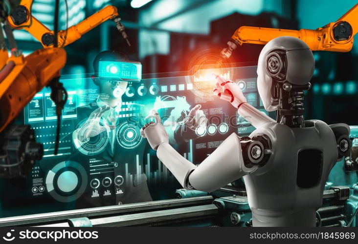 Mechanized industry robot and human worker working together in future factory . Concept of artificial intelligence for industrial revolution and automation manufacturing process .. Mechanized industry robot and human worker working together in future factory