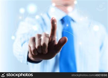 Media globalization. Chest view of businessman touching icon of media screen