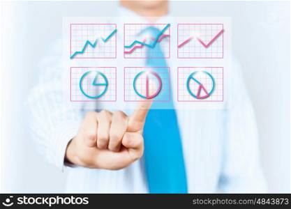 Media interface. Hand of businessman pressing with finger icon on virtual screen