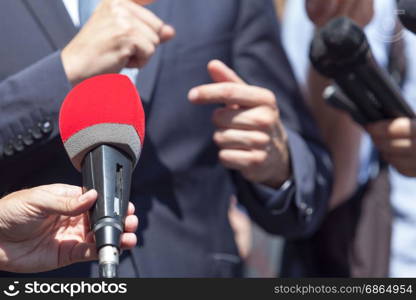 Media interview with business person, politician or spokesperson
