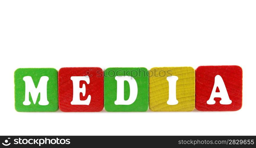 media - isolated text in wooden building blocks