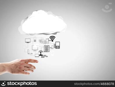 Media symbols. Close up of businessman hand holding cloud with media icons