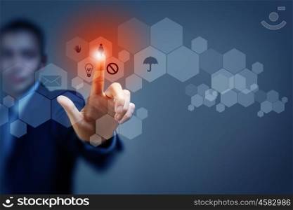 Media technologies. Close up of businessman touching icon of media screen