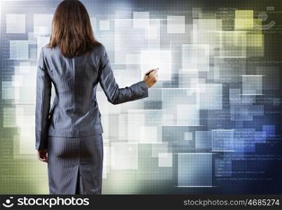 Media technologies. Close up of businesswoman touching media screen with stylus