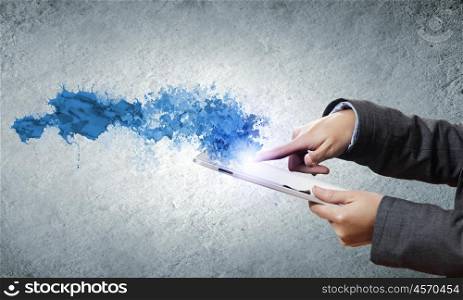 Media technologies. Close up of human hands holding tablet pc