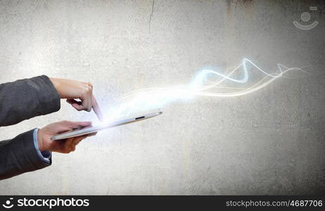 Media technologies. Close up of human hands holding tablet pc