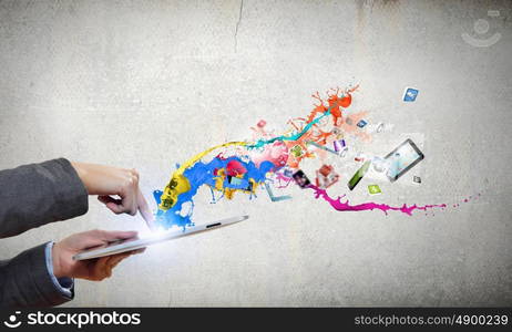 Media technologies. Close up of human hands holding tablet pc