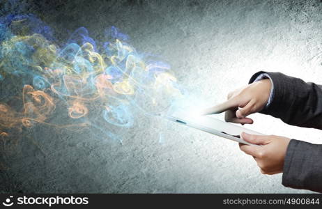 Media technologies. Close up of human hands holding tablet pc