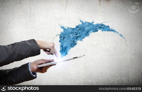 Media technologies. Close up of human hands holding tablet pc