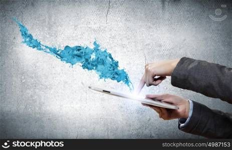 Media technologies. Close up of human hands holding tablet pc