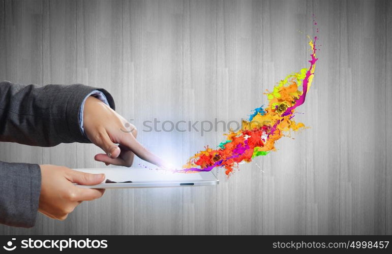 Media technologies. Close up of human hands holding tablet pc