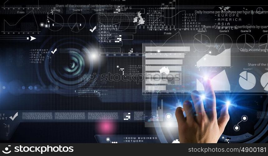 Media technologies for business. Businessman hand pushing business graph on touch screen interface