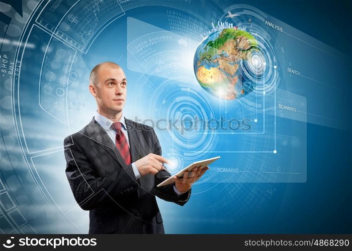 Media technologies. Image of businessman with tablet pc. Elements of this image are furnished by NASA