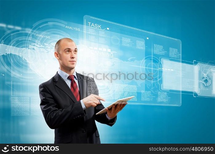 Media technologies. Image of businessman with tablet pc against media background