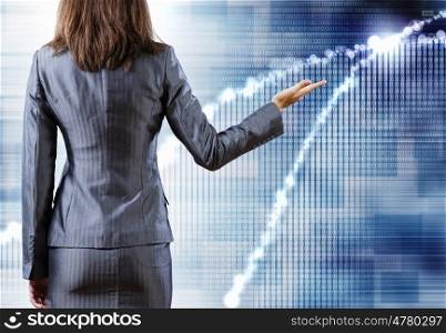 Media technologies. Rear view of businesswoman and media digital background