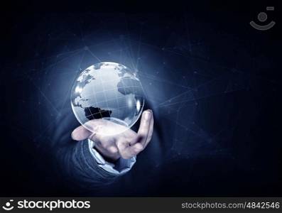 Media worldwide technology concept. Man hand holding digital Earth planet representing global technologies concept