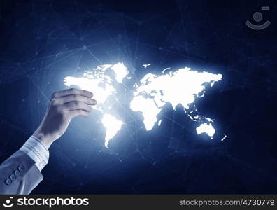 Media worldwide technology concept. Man hand holding digital world map representing global technologies concept