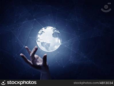 Media worldwide technology concept. Man hand taking digital Earth planet representing global technologies concept