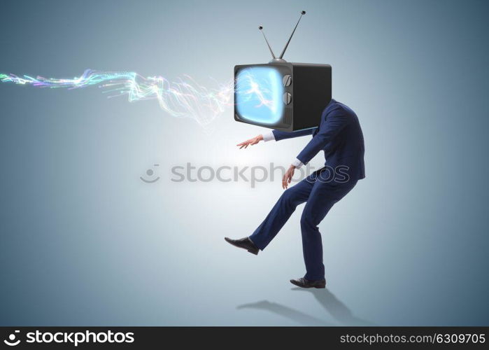 Media zombie concept with man and tv set instead of head