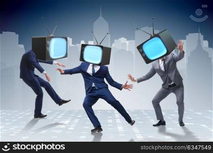 Media zombie concept with man and tv set instead of head. The media zombie concept with man and tv set instead of head
