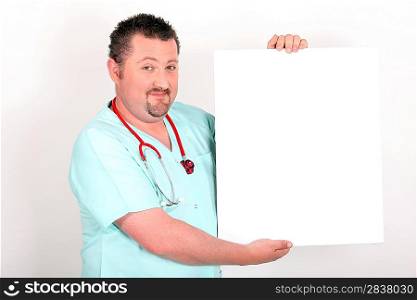 Medic holding a board left blank for your message