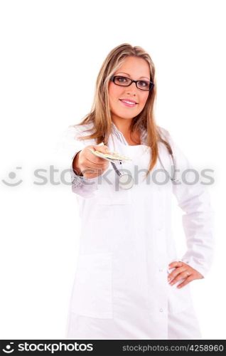 Medic holding some pills, isolated over white