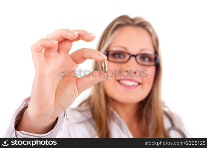 Medic holding some pills, isolated over white