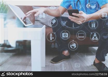 Medical and Health context,doctor hand working with smart phone,digital tablet computer,stethoscope,sitting on sofa in living room,virtual graphic interface icons screen