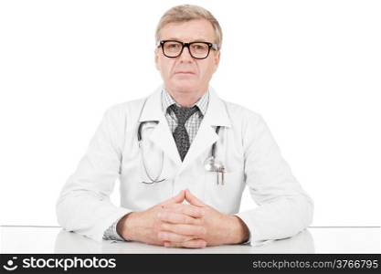 Medical doctor his hands above table