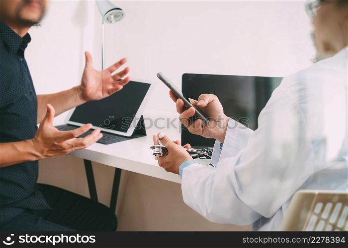 Medical doctor in white uniform gown coat consulting businessman patient having exam as Hospital professionalism concept