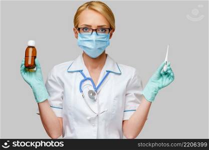 medical doctor nurse woman wearing protective mask and rubber or latex gloves - holding can of medicine and thermometer.. medical doctor nurse woman wearing protective mask and rubber or latex gloves - holding can of medicine and thermometer
