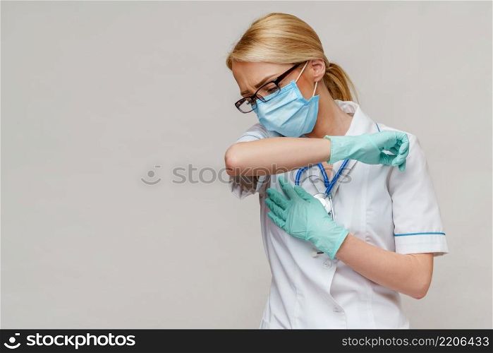 medical doctor nurse woman wearing protective mask and rubber or latex gloves - cough.. medical doctor nurse woman wearing protective mask and rubber or latex gloves - cough