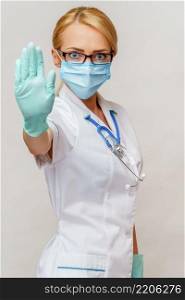medical doctor nurse woman with stethoscope wearing protective mask.. medical doctor nurse woman with stethoscope wearing protective mask