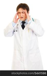 Medical doctor with headache holding hands at head isolated on white&#xA;