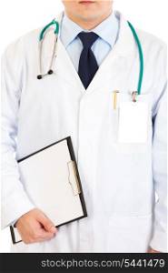 Medical doctor with stethoscope holding clipboard isolated on white. Close-up.&#xA;