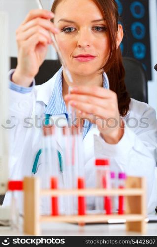 Medical doctor woman conducting tests in laboratory&#xA;