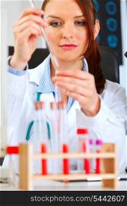 Medical doctor woman conducting tests in laboratory&#xA;