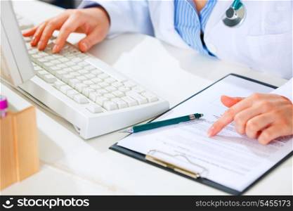 Medical doctor woman working at office table. Closeup.&#xA;